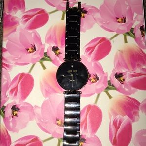 Black and gold link watch